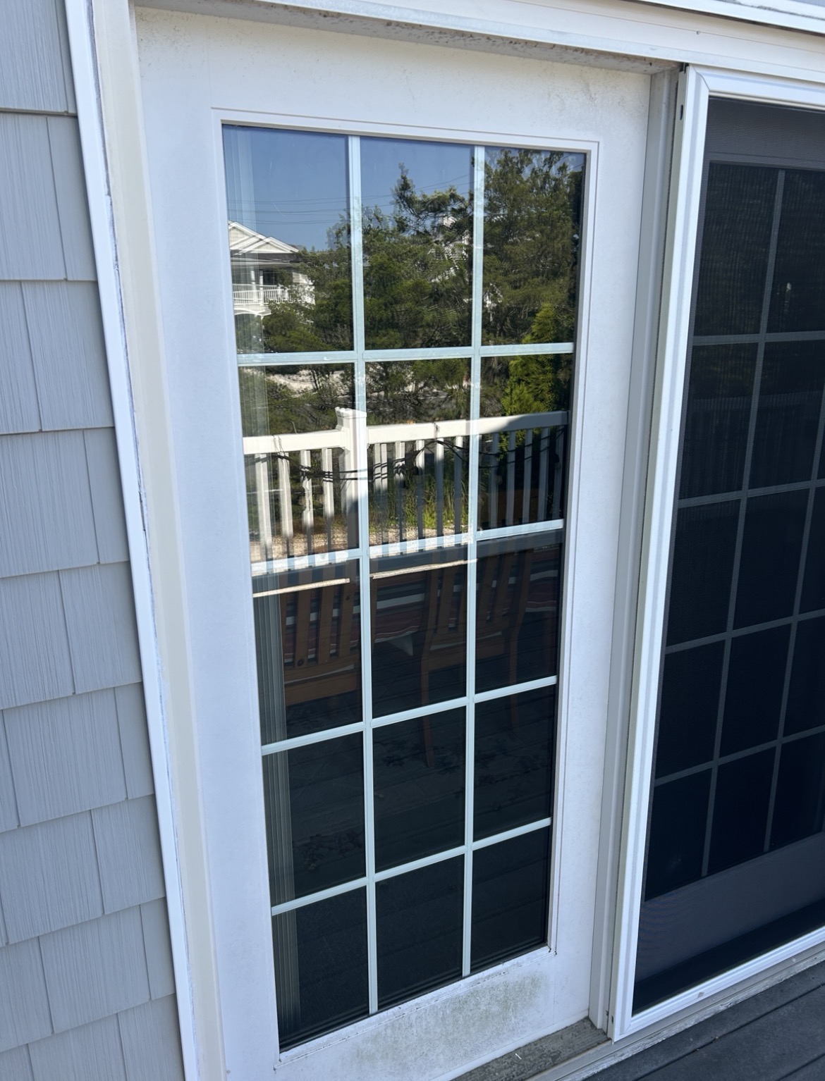 Before professional exterior window cleaning showing weathered residential glass