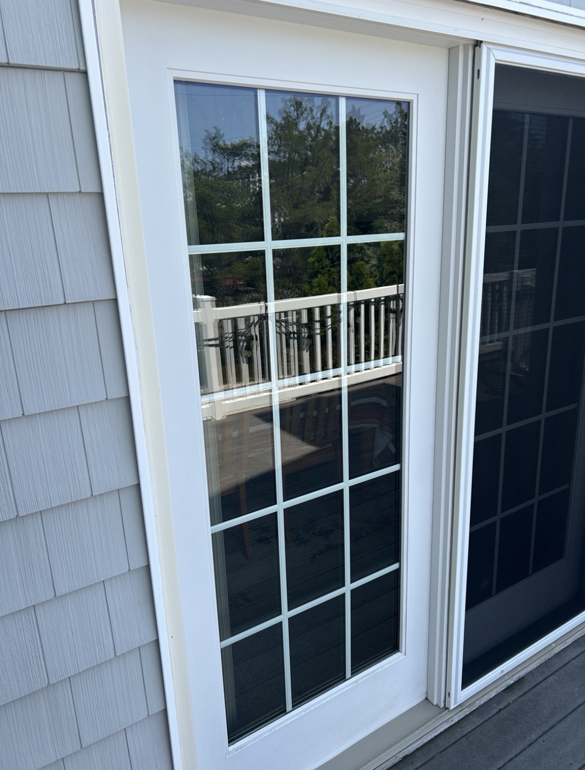 After professional exterior window cleaning showing pristine crystal clear glass